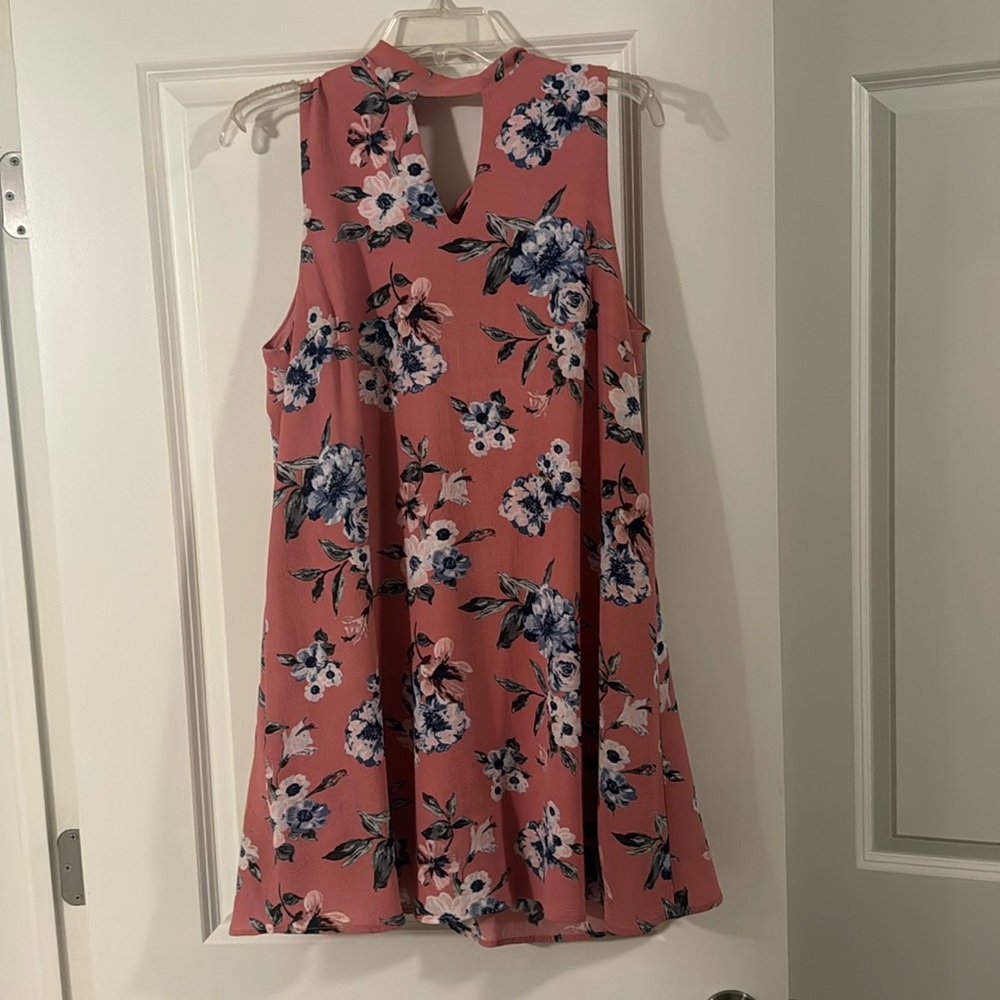 Pink and blue floral mini dress. Neck tie in the back.